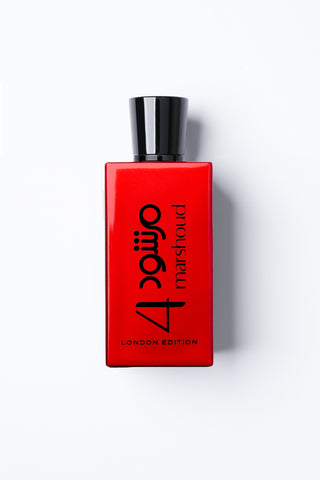 Marshoud4 Red perfume bottle with black cap on a white background by Atyab Al Marshoud